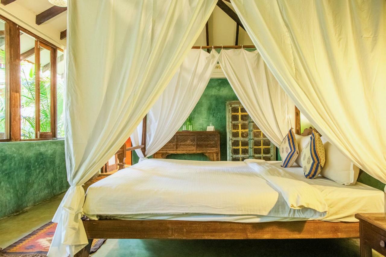 Devarya Wellness Beach Resort Morjim Habitación foto