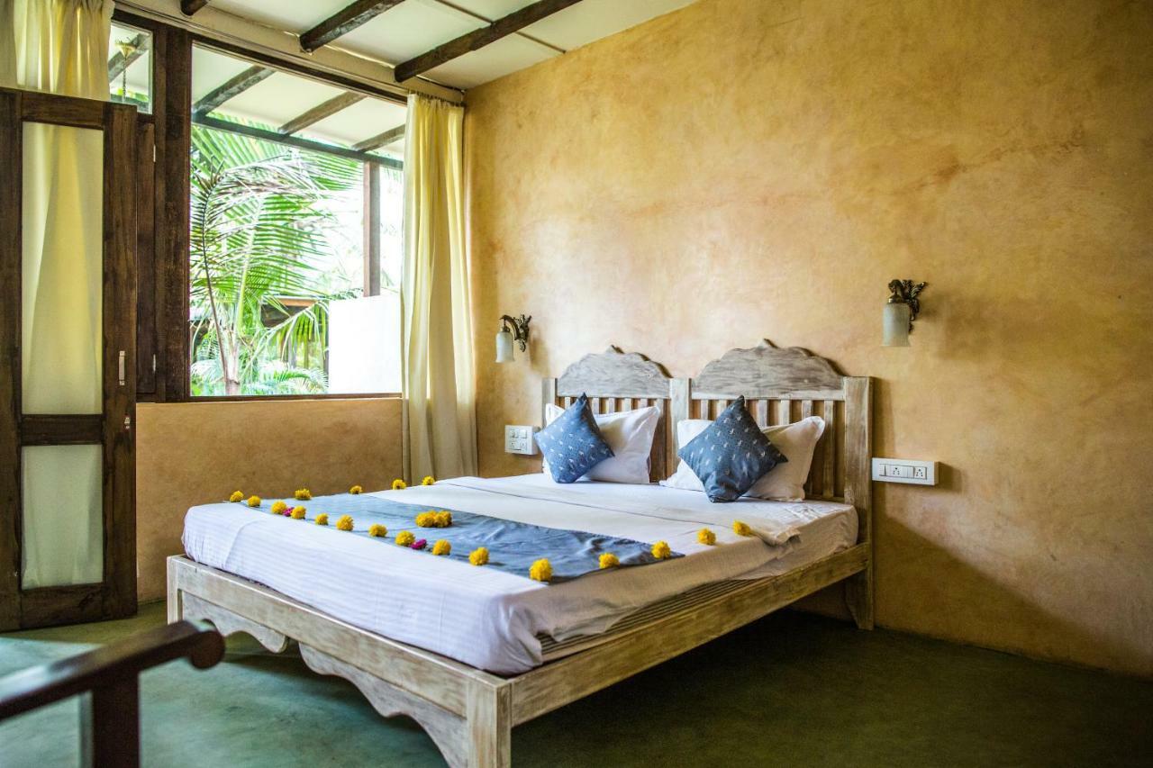 Devarya Wellness Beach Resort Morjim Habitación foto